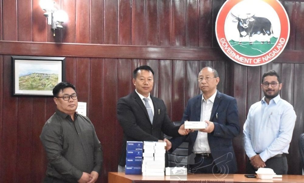 KS Anden Konyak handing over 24 fingerprint scanners and 24 smartphones to the Department of Economics and Statistics on April 23. (DIPR Photo)